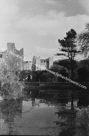 HOWTH CASTLE  LUTYEN'S TOWER (1911) AND STABLES FROM POND